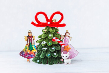 Two Christmas angel and reindeer with Christmas tree on white background, Christmas decoration, greeting card background idea