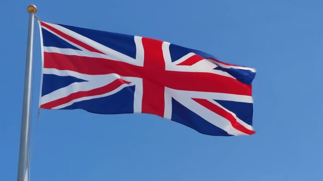 Union Jack flag waving against blue sky symbolizing British identity unity and cultural heritage