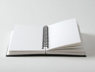 Obraz premium 何も書かれていない白紙ページが広がるアイデア整理や計画立案に使えるノートのイメージ