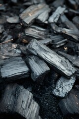 Pile of charcoal chunks and fine particles biochar