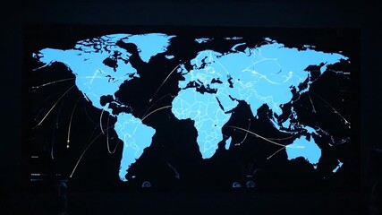 A digital world map in blue and black, showing global connections with glowing lines - Powered by Adobe