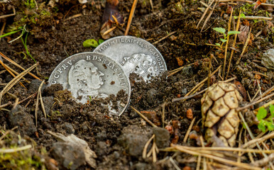 Ancient coins found in the ground.Find a treasure trove of coins.Hobby metal search.