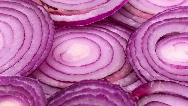 Slices of red onion closeup. Healthy vegetable, food macro