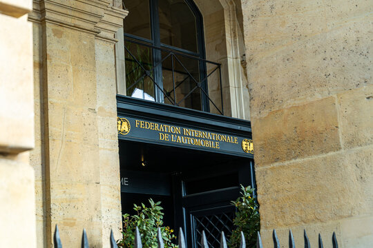 Paris, France - October 30, 2025: street Entrance to headquarters of International Automobile Federation FIA in Paris. Sign banner under door