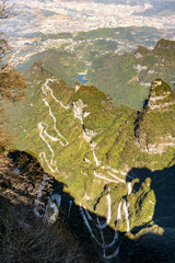 Tianmen Mountain with its pierced rock above the city of Zhangjiajie in Hunan, China.