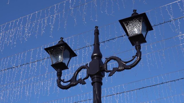 View of street lights in urban area.