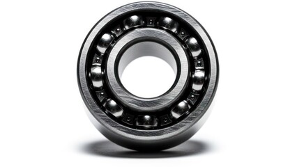 Silver ball bearing, detailed concentric circles, shadow on a white surface