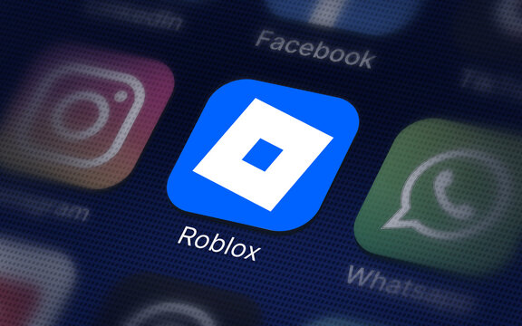 Roblox company logo on the smartphone screen