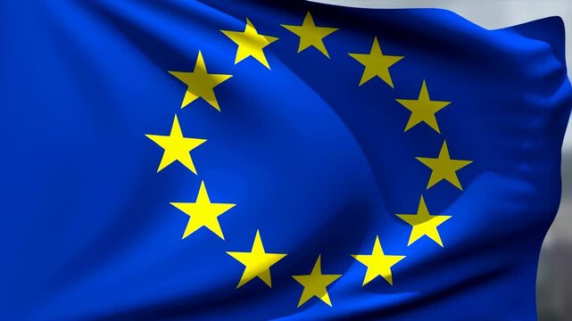 European union flag waving in the wind against a clear sky background