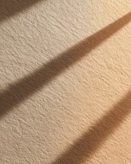 Texture of Light: Abstract composition featuring light and shadow dancing across a textured surface, creating a visual symphony of contrasts and patterns.