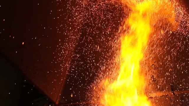 Sparks And Flame Burst From Blacksmith Furnace,