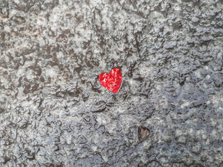 red heart over stone