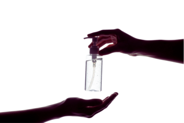 A hand dispensing sanitizer into another person's hand, promoting health and cleanliness isolated on transparent background