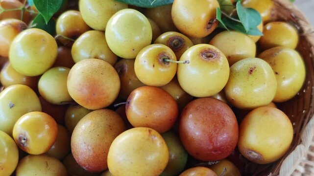 Sweet and sour jujubes in a basket.