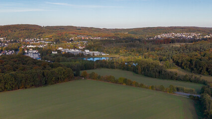 Panoramic view of Menden in the Sauerland region with industrial facilities and adjacent green spaces