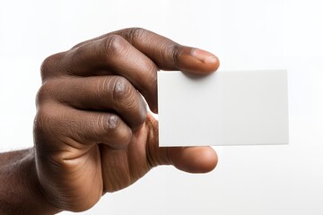 Obraz premium African male hand holding blank white card for business or contact information
