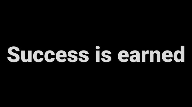 Motivational phrase success is earned displayed in bold white text against a simple black background