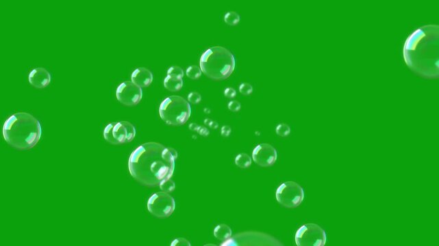Flying water bubbles green screen motion graphics, 4k, loop. flying soap bubbles on green screen background , vertical orientation. Soap bubbles rise towards a green screen