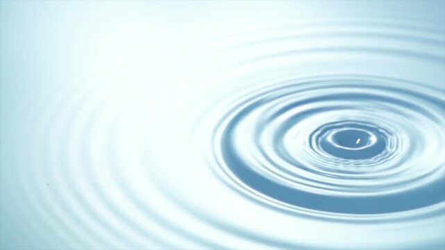 Slow motion water drop splash creating smooth ripples on calm surface with minimal clean background symbolizing purity, freshness, balance and relaxation