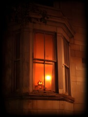 Old church window with stone arch and soft light