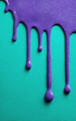 Purple liquid drips on cyan surface, with drops and smooth textures