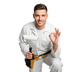 Professional house painter and repair service contractor holds a paint roller while showing an okay sign gesture to confirm high maintenance standards during a home renovation or indoor project