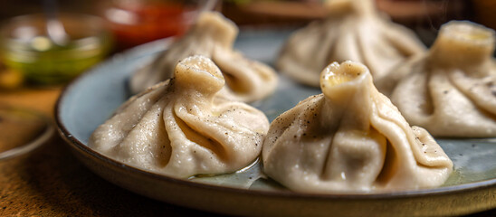 Fototapeta premium Georgian khinkali dumplings served in restaurant