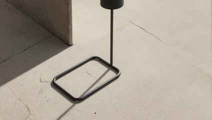 Minimalist Floor Lamp Casting Shadow on Beige Floor.