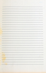 Naklejka premium Old lined notebook paper texture with yellow aging spots. A vintage blank sheet background perfect for education, writing, or retro design concepts.