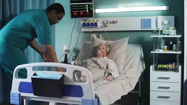 Doctors rushing to senior ICU patient to perform CPR, medical emergency response