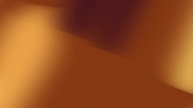 Blurred gradient of orange, brown, and maroon colors, perfect for autumnthemed designs, backgrounds, and graphics with warm tones.
