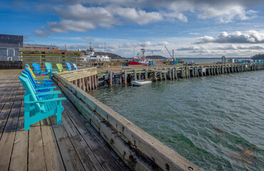 Obraz premium Deck chairs on the wharf at Lunenburg, Nova Scotia, Canada