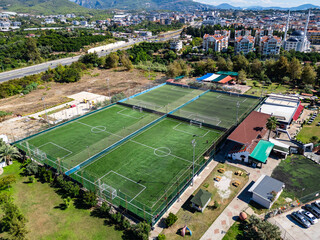 Aerial Perspective of a Training Facility with Multiple Football Pitches and Surrounding Amenity Areas © Projecturk