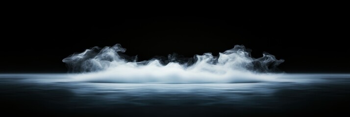 Fototapeta premium Mystical smoke rising from black horizon creating eerie atmosphere