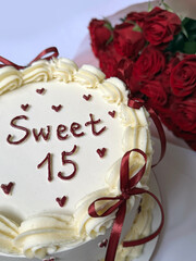 Sweet Fifteen Birthday Cake with Candles and Cream Decoration