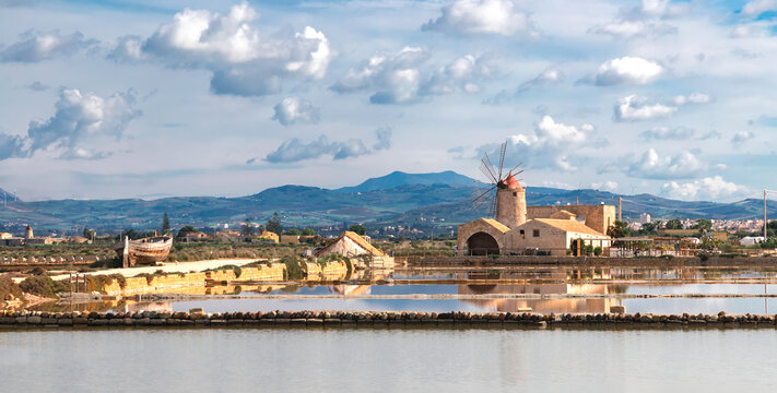 Famous salt museum pans and windmill, popular tourist attraction, Trapani Sicily