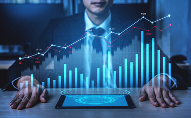 A business professional engaged in data analysis using a tablet displays detailed graphs and charts illustrating market trends and performance metrics. Scalp