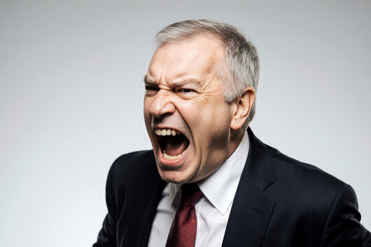 Portrait of Angry Middle Aged Businessman Shouting