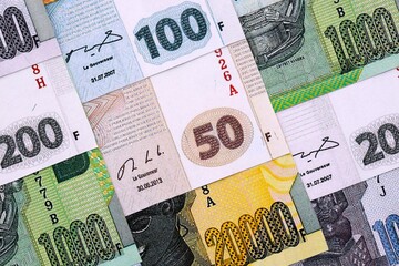 Congolese franc money bills in big amount on table close up. Rich life concept in Democratic Republic of Congo. Business and economy © mehaniq41