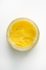 Top view of melted dairy butter ghee in jar