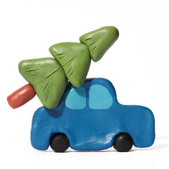 Blue plasticine car with a Christmas tree on a white background
