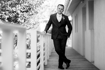 portrait of the groom of a man in the morning before the wedding