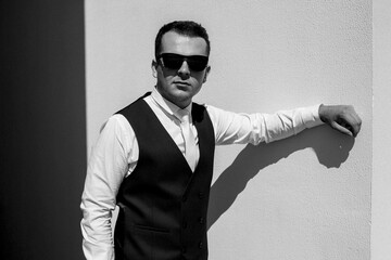 portrait of the groom of a man in the morning before the wedding