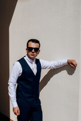 portrait of the groom of a man in the morning before the wedding