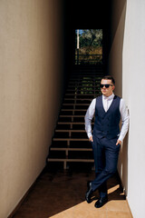 portrait of the groom of a man in the morning before the wedding