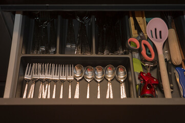 clean silverware in a drawer