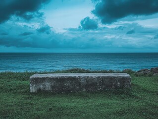 Tranquil Coastal Bench Overlooking Serene Ocean at Twilight Hour