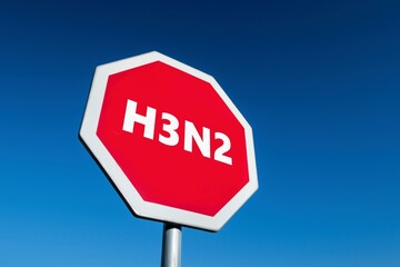 Traffic sign with H3N2 text to stop spread of new mutation of flu