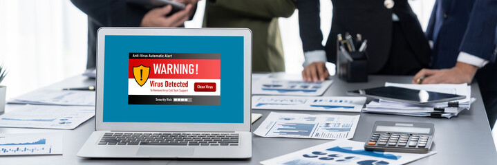 Virus warning alert on computer screen detected brisk cyber threat , hacker, computer virus and malware