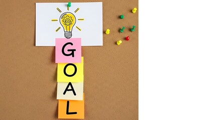 Conceptualizing business goals and bright ideas using colorful sticky notes pinned to a cork board